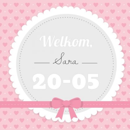 Geboortekaartje met ronde kader en roze strik op hartjes