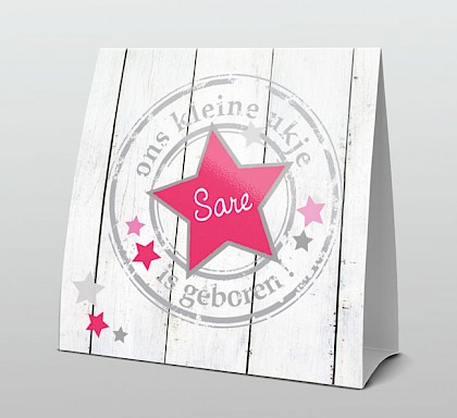 Stoer met roze sterretjes op hout