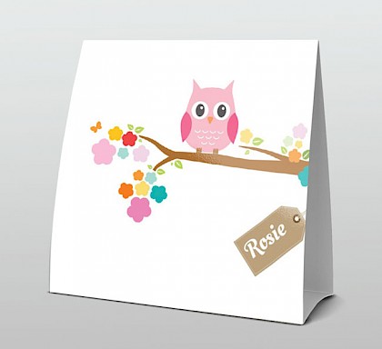 Roze uiltje en gekleurde bloemetjes