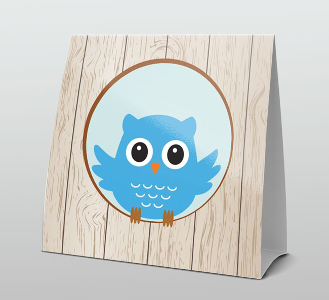 Uil in rondje op hout Uil in rondje op hout